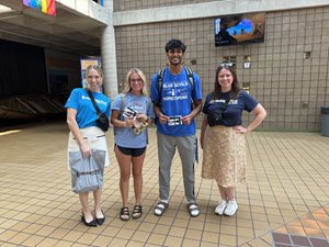 Michigan First Community Crew handing out gifts at LTU for the start of the semester. 