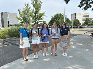 Michigan First Community Crew handing out gifts at LTU for the start of the semester. 